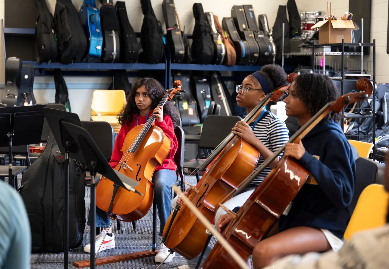 KEYS cello students rehearsing together