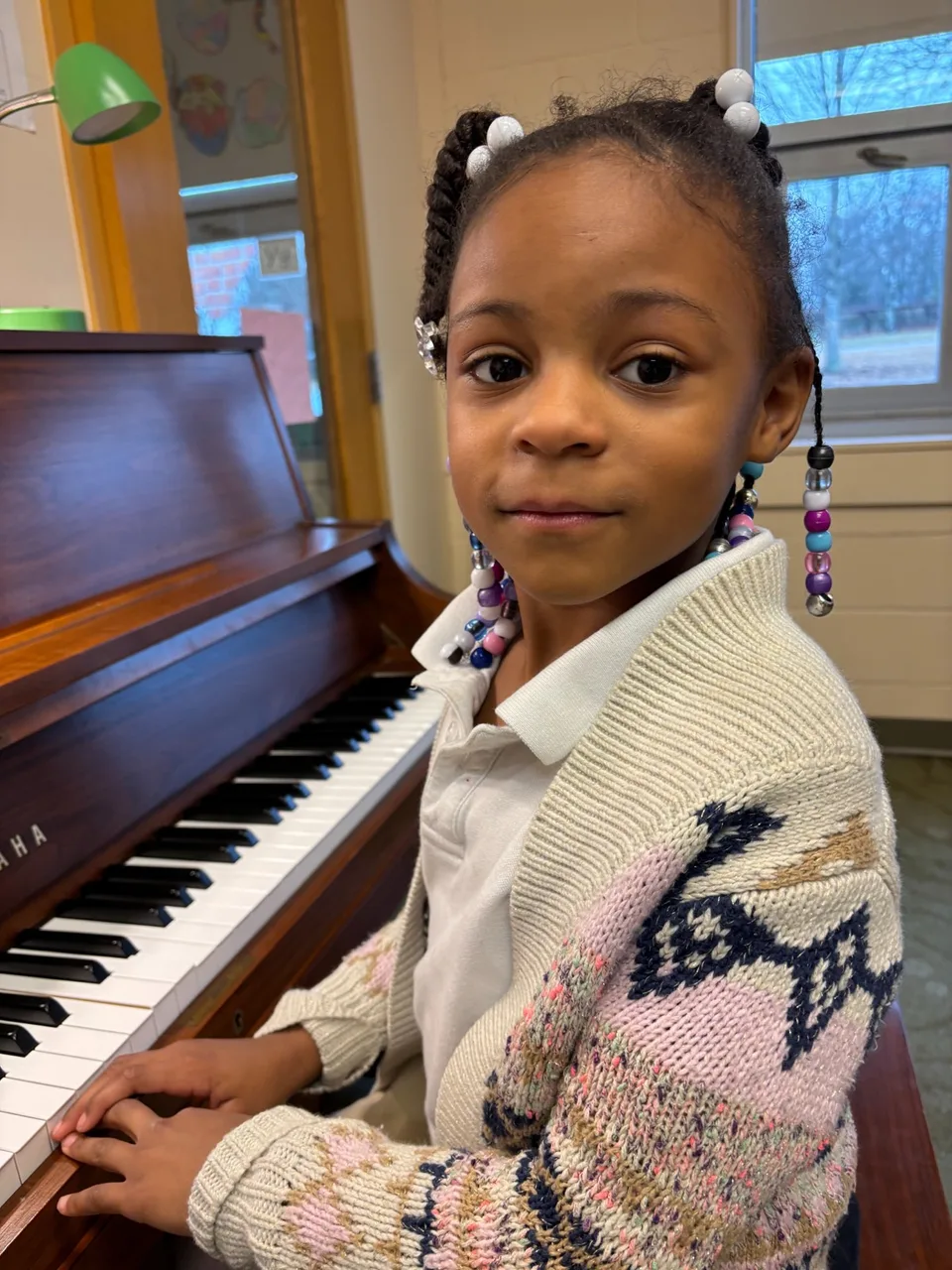 Hands on piano keys